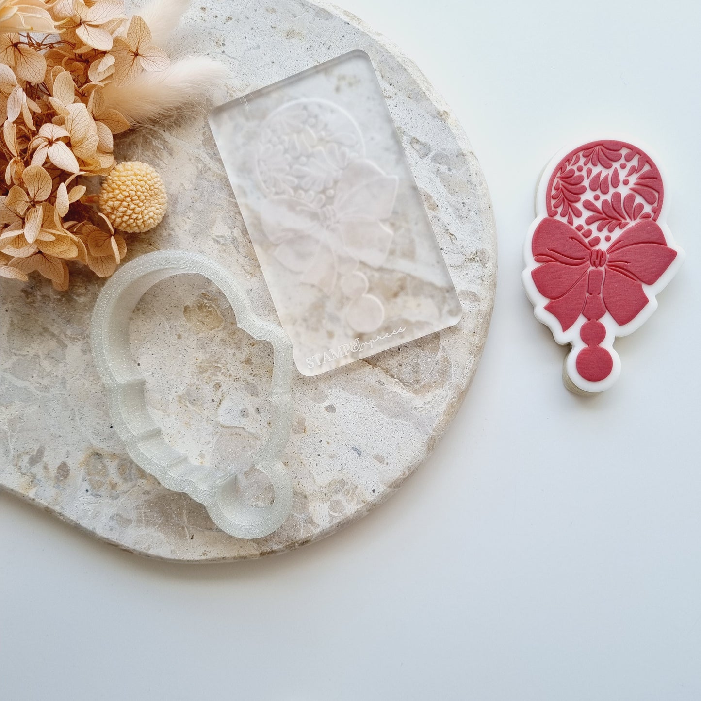 cielito lindo rattle with bow pattern floral baby shower cookie stamp cookie cutter stampandimpress