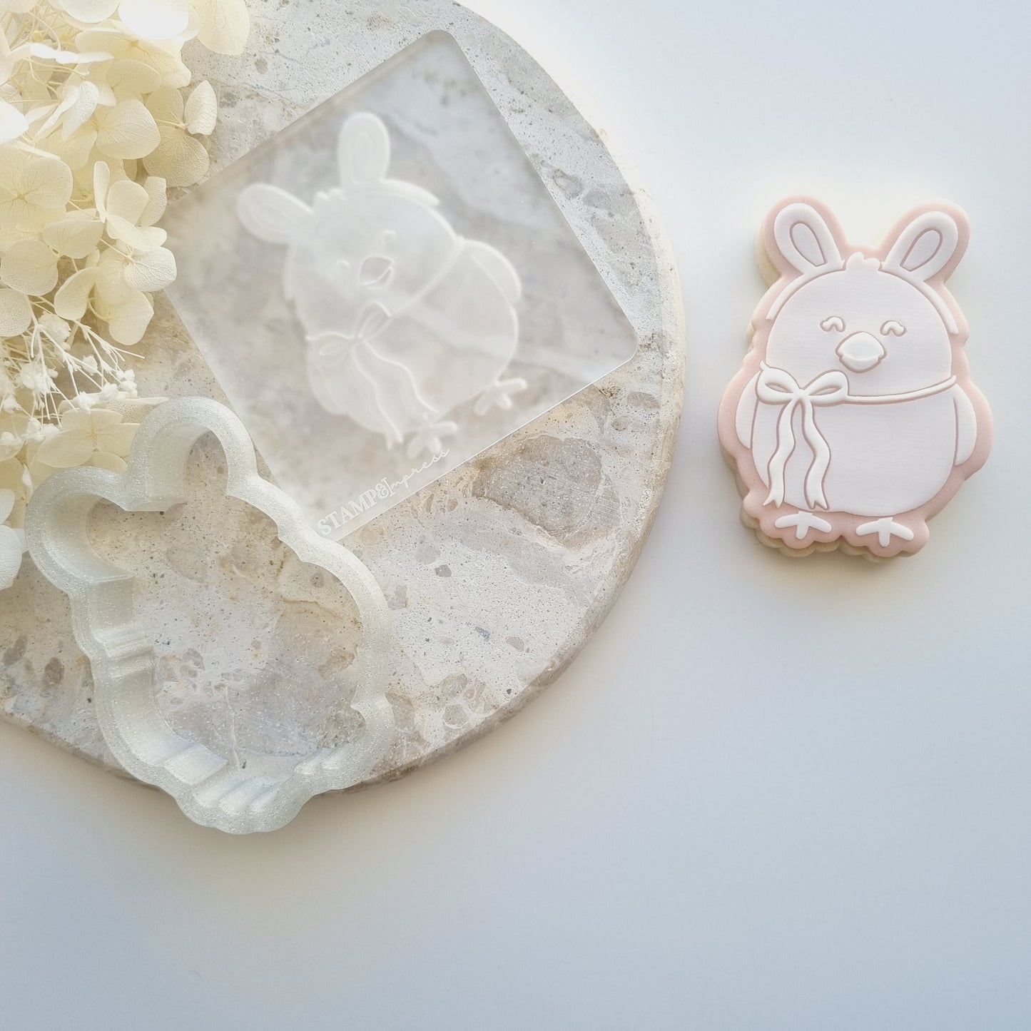 easter fondant debosser cookie stamp cookie cutter stampandimpress chick wearing easter bunny ears bow cute