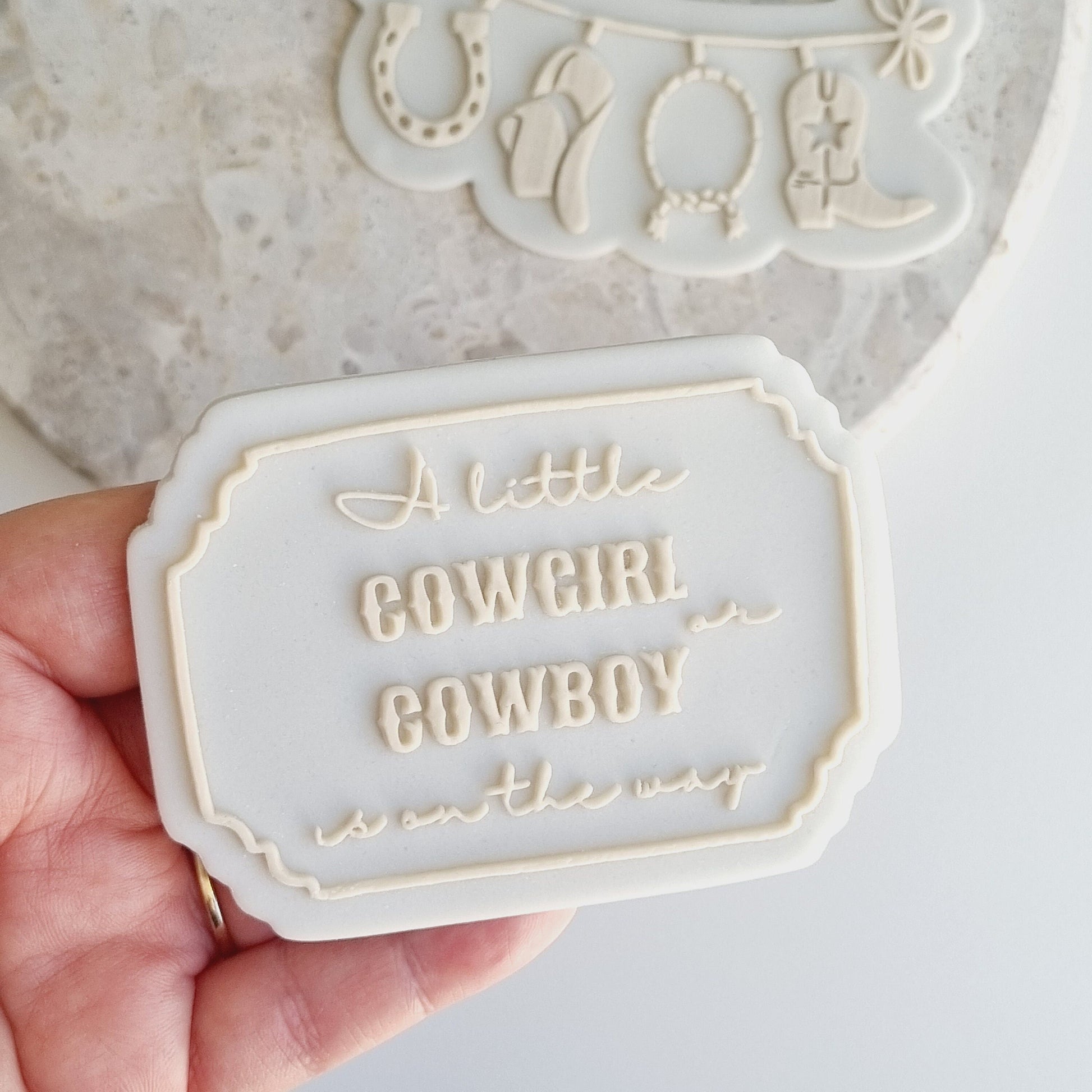 cookie cutter cookie stamp stampandimpress stamp & impress baby shower boy girl a little cowboy or cowgirl is on the way bunting clothesline boot hat lasso lasoo horseshoe horse rodeo hoedown plaque