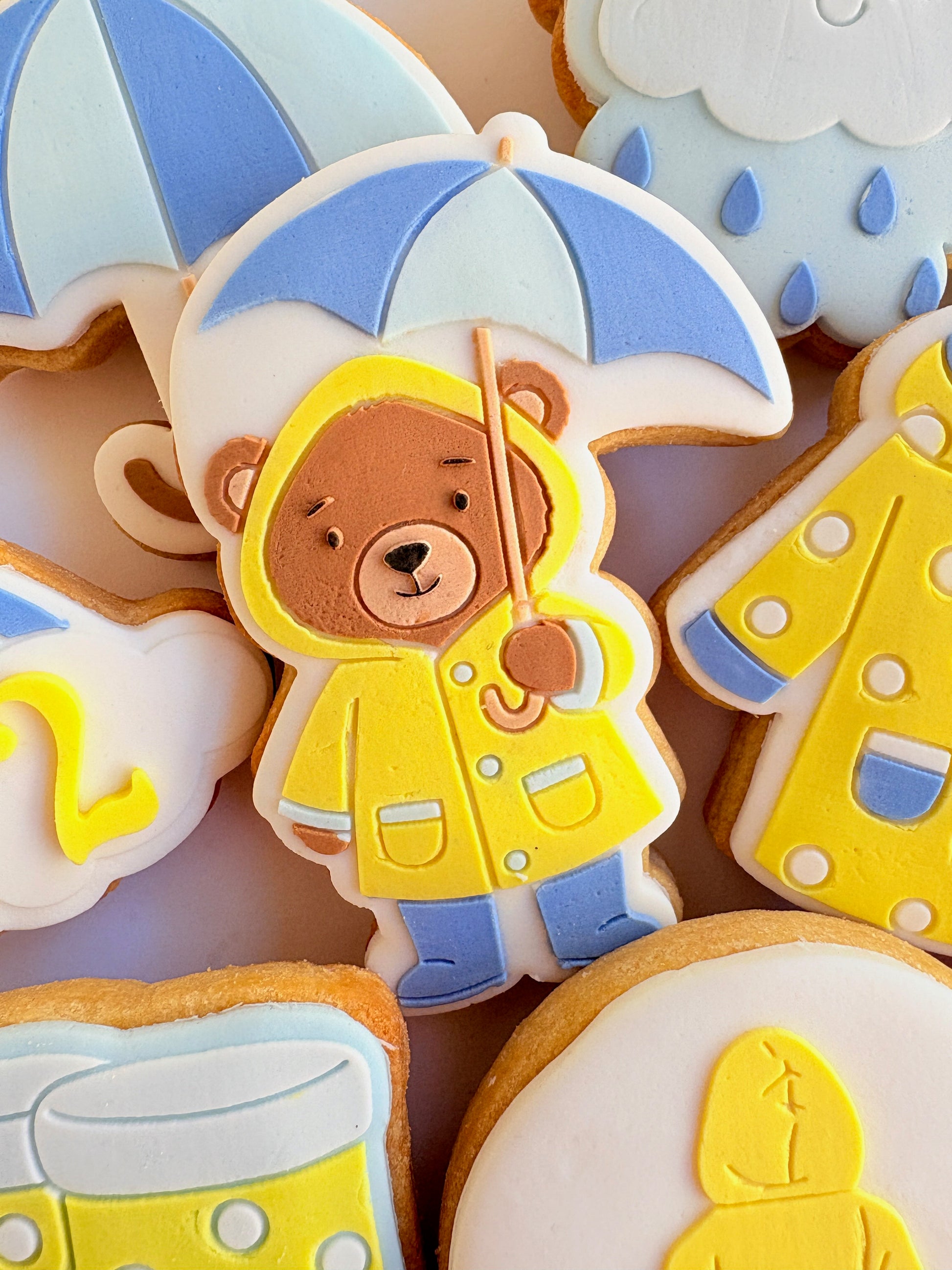 teddy bear in the rain umbrella rainy day sunshine raincoat rain boots gumboots boy jumping in puddle sun shower cloud rainbow cookie stamp cookie cutter stampandimpress