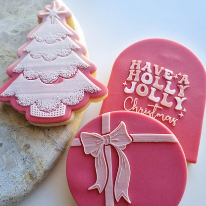 have a holly jolly christmas cookie stamp cookie cutter fondant debosser stampandimpress christmas tree gift ribbon bow