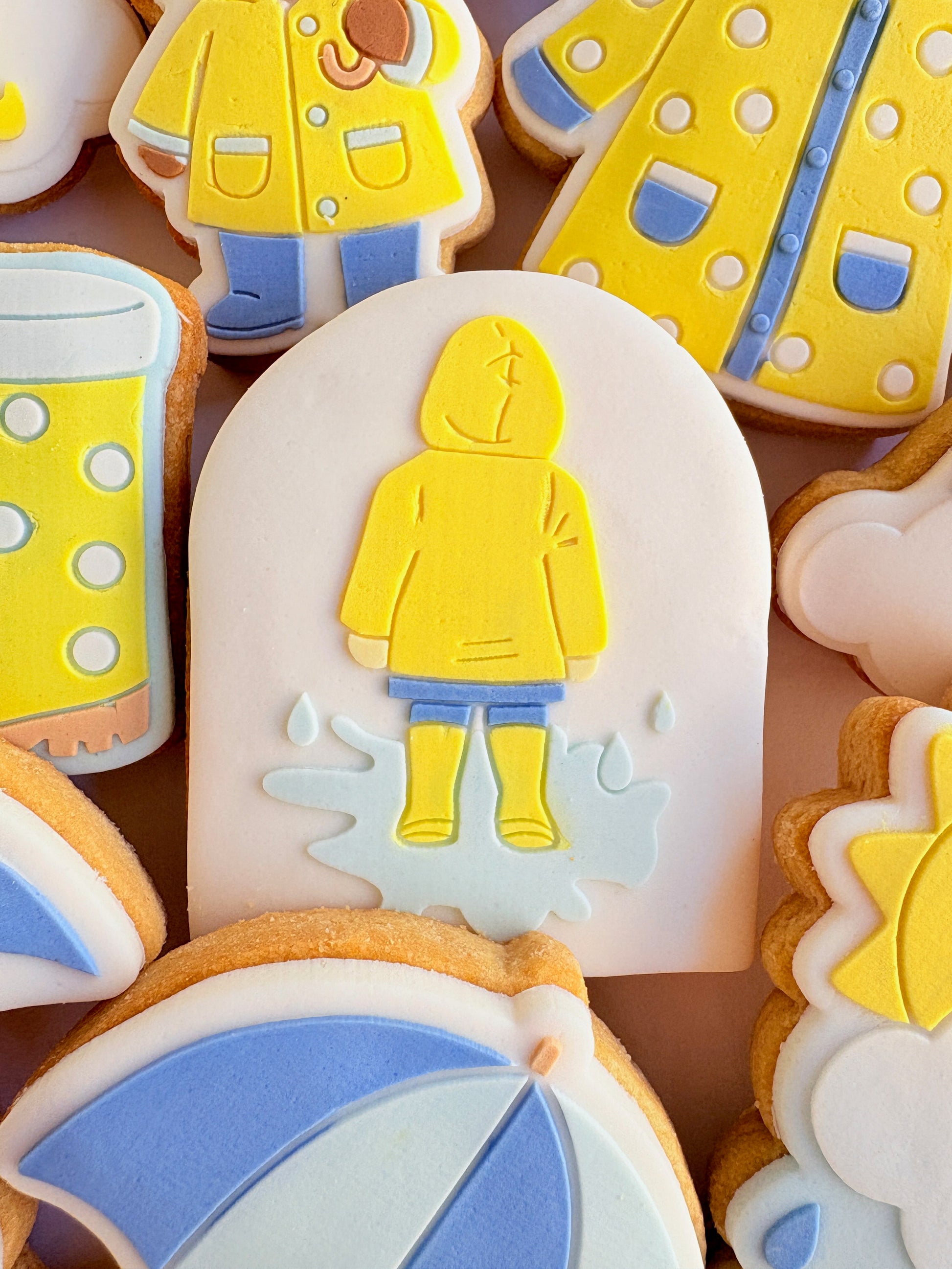 teddy bear in the rain umbrella rainy day sunshine raincoat rain boots gumboots boy jumping in puddle sun shower cloud rainbow cookie stamp cookie cutter stampandimpress