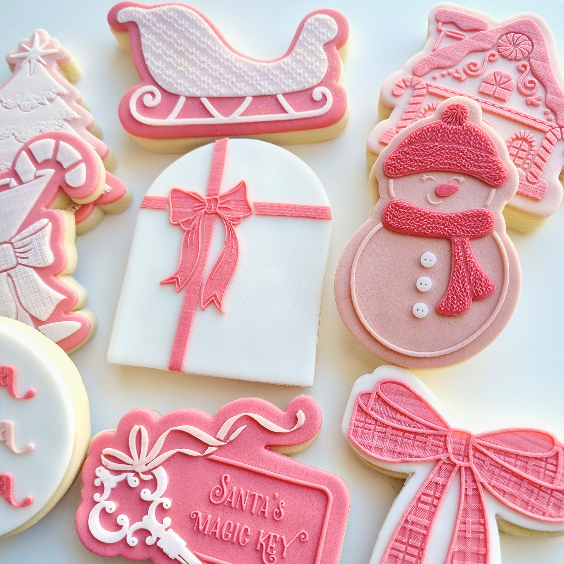 snowman bow santas magic key santas sleigh gingerbread house cocktail christmas tree fa la la cookie stamp cookie cutter stampandimpress fondant debosser