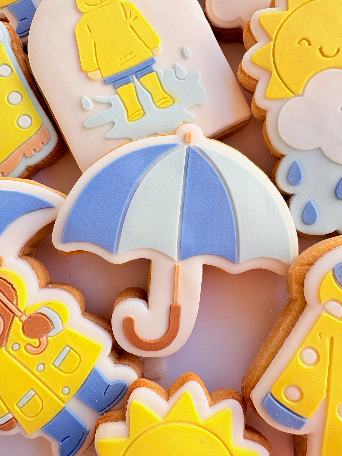 teddy bear in the rain umbrella rainy day sunshine raincoat rain boots gumboots boy jumping in puddle sun shower cloud rainbow cookie stamp cookie cutter stampandimpress