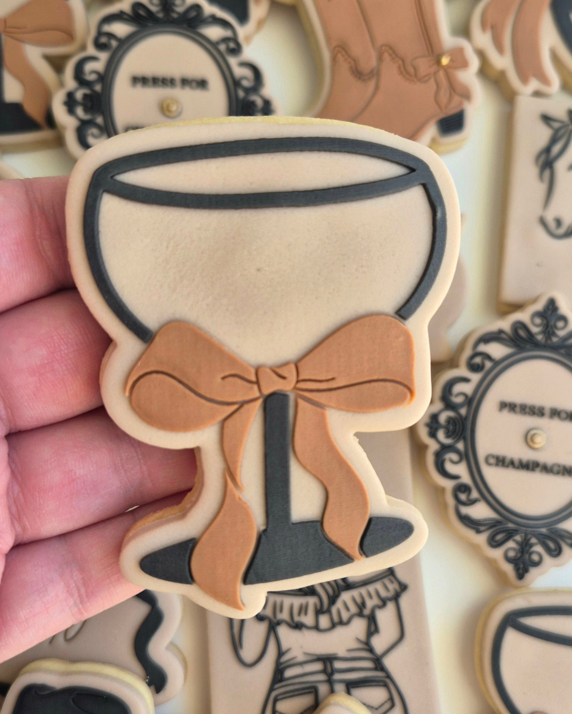 champagne cowgirl cowboy boots with hat cowboy hat cowboy boots with bow 40 forty press for champagne horseshoe with bow champagne bottle cocktail glass with bow horse head rodeo hens bride to be bow border cookie stamps cookie cutters stampandimpress