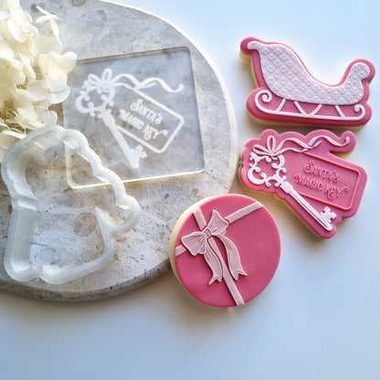 santas magic key santas sleigh sled bow ribbon gift fondant debosser cookie stamp cookie cutter stampandimpress